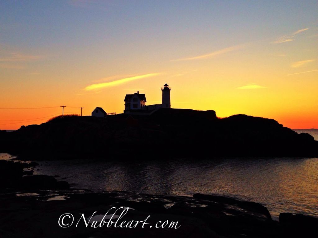An image of Nubble Light at sunrise.