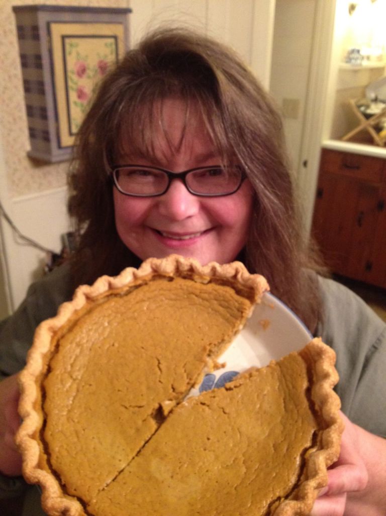 Here is my Aunt PJ and her Squash Pie she made last Christmas Eve for my family's holiday celebration.