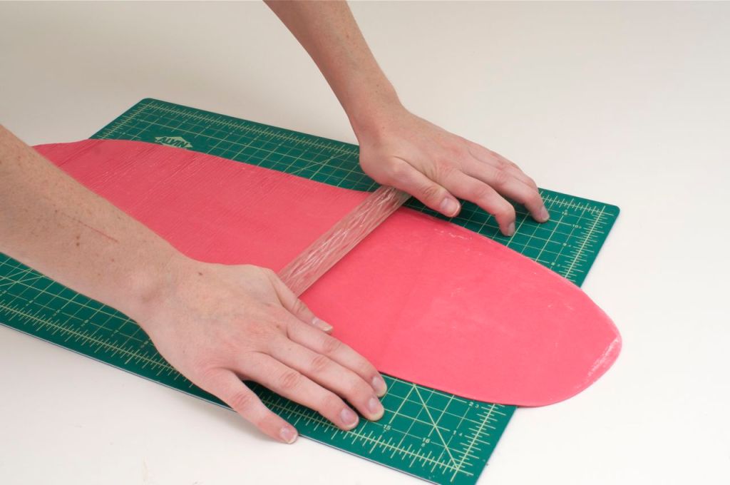 Using a textured rolling pin and even pressure, carefully roll out a raised design.