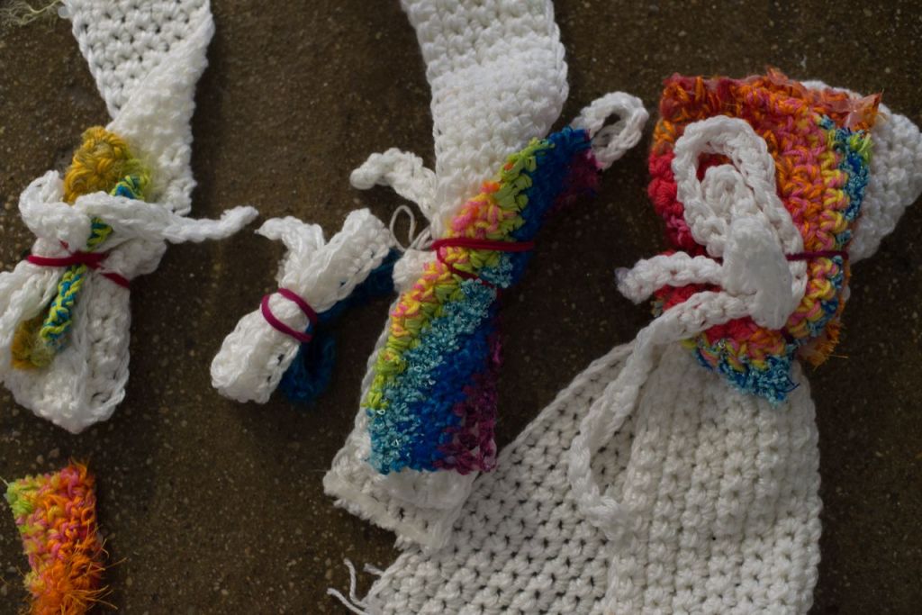 Ron gave London a blank display cake.  (The “cake” is round sections of Styrofoam covered in fondant that is dried.) She made all of her measurements and crocheted everything first and brought everything in sections.